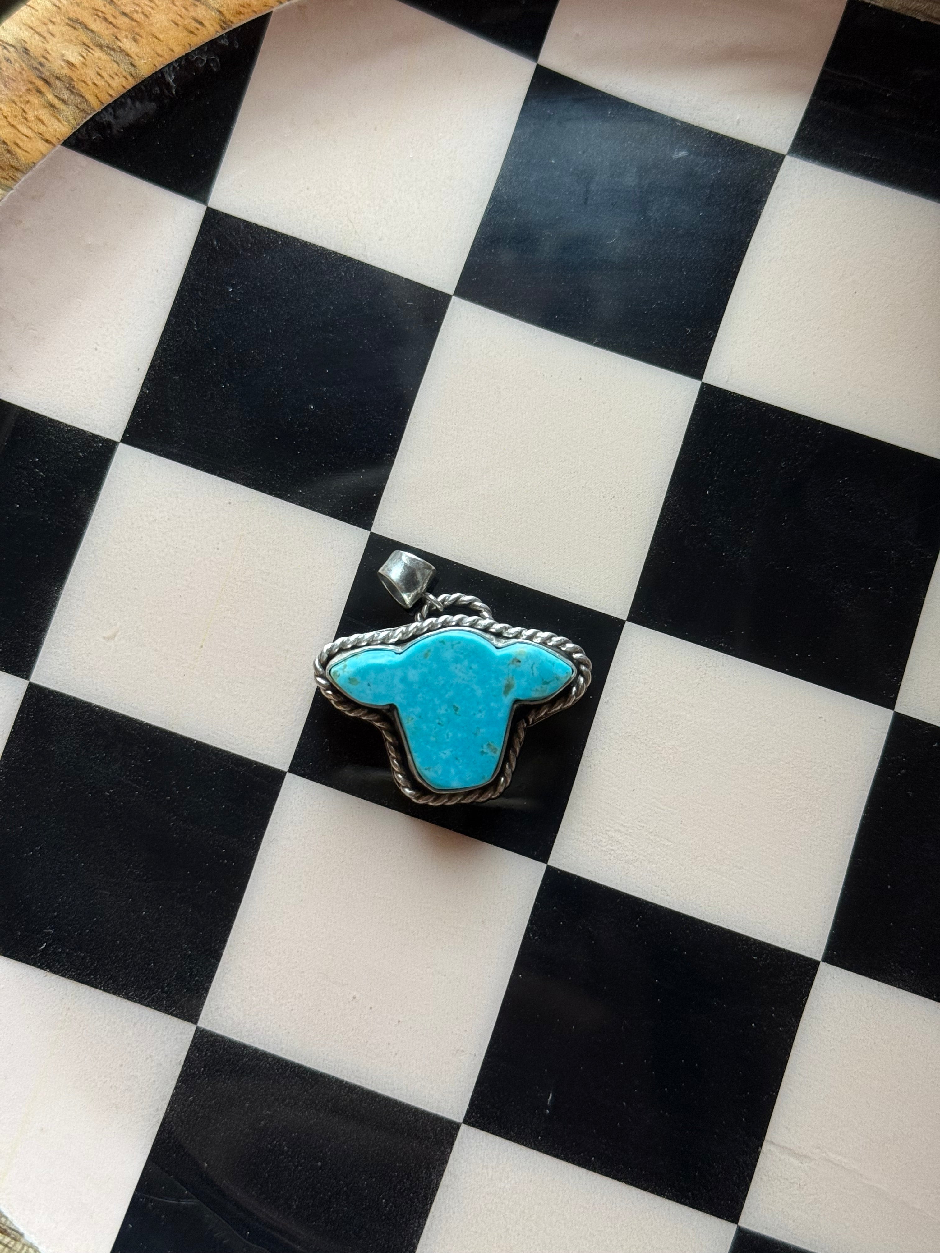Calf head turquoise pendant