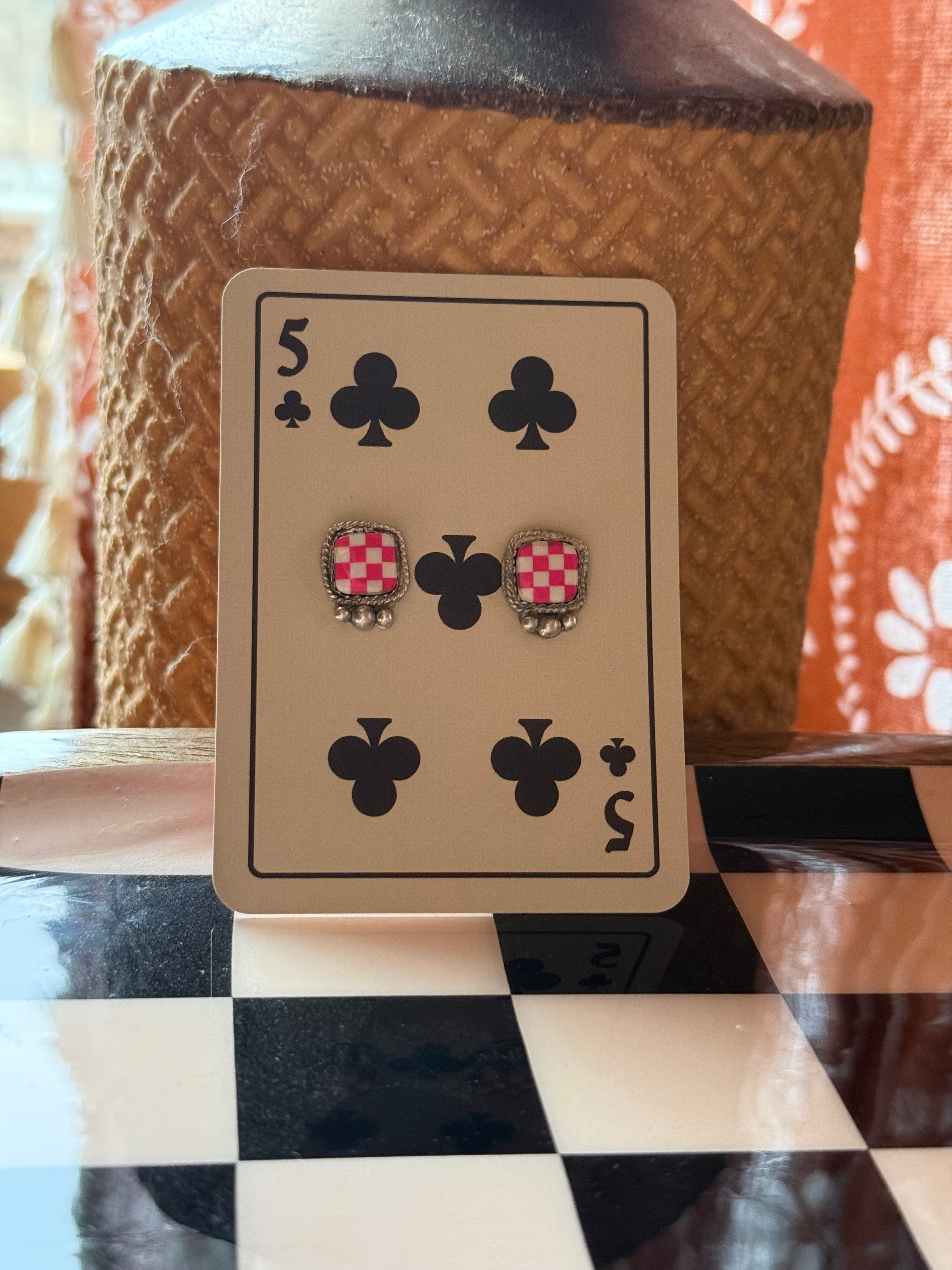 Pink checkered studs