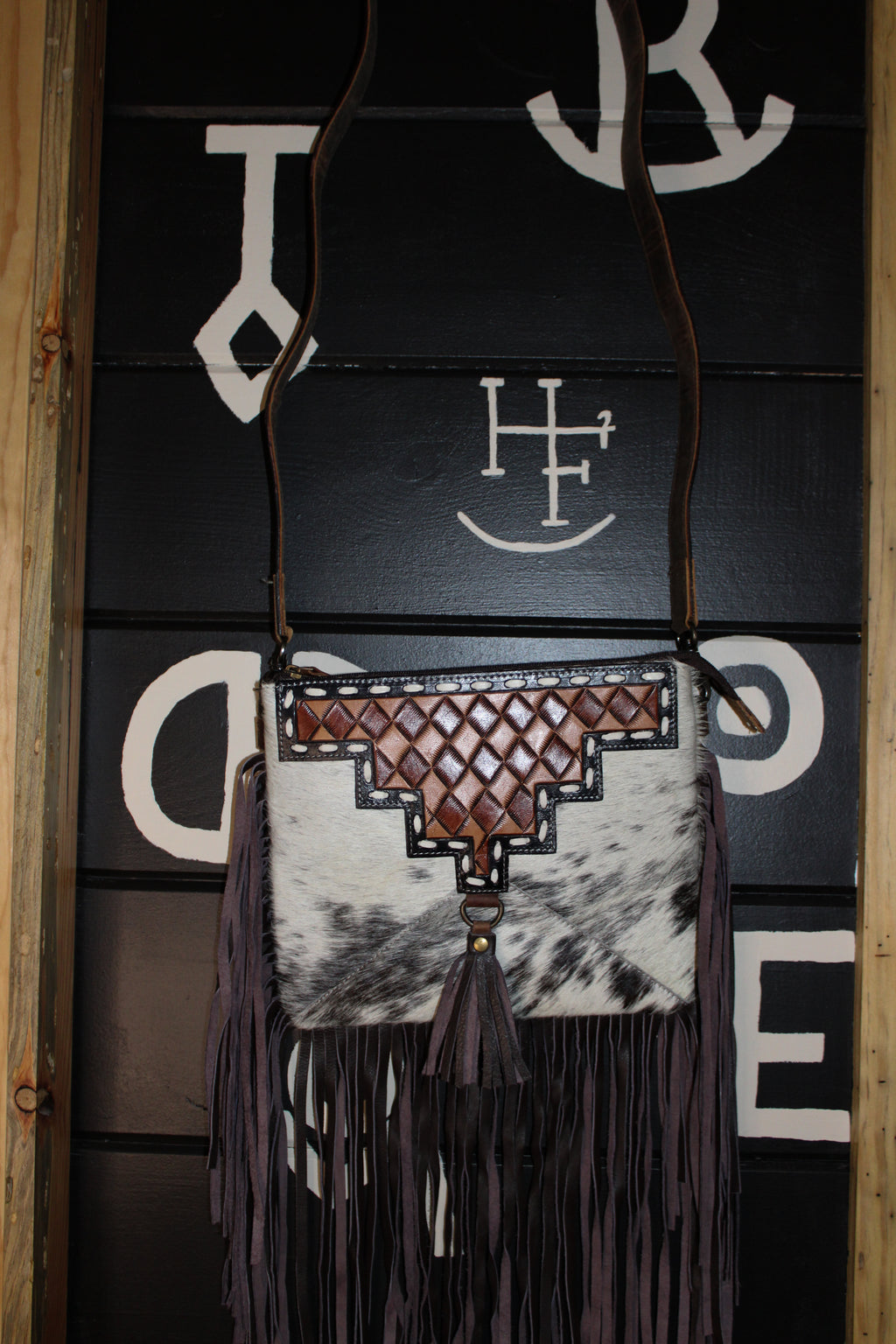 Brown checkered tooled and cowhide fringe crossbody