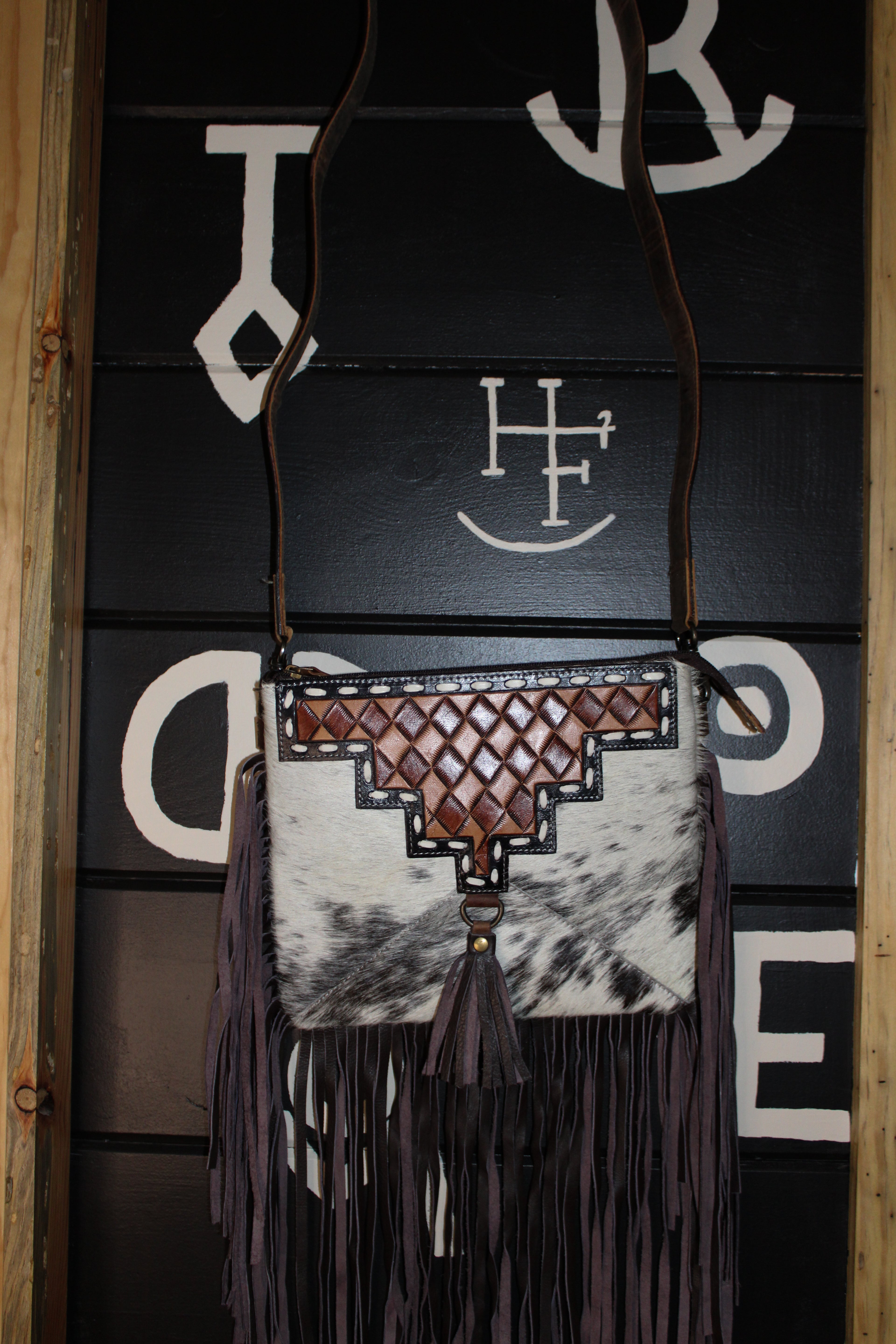 Brown checkered tooled and cowhide fringe crossbody