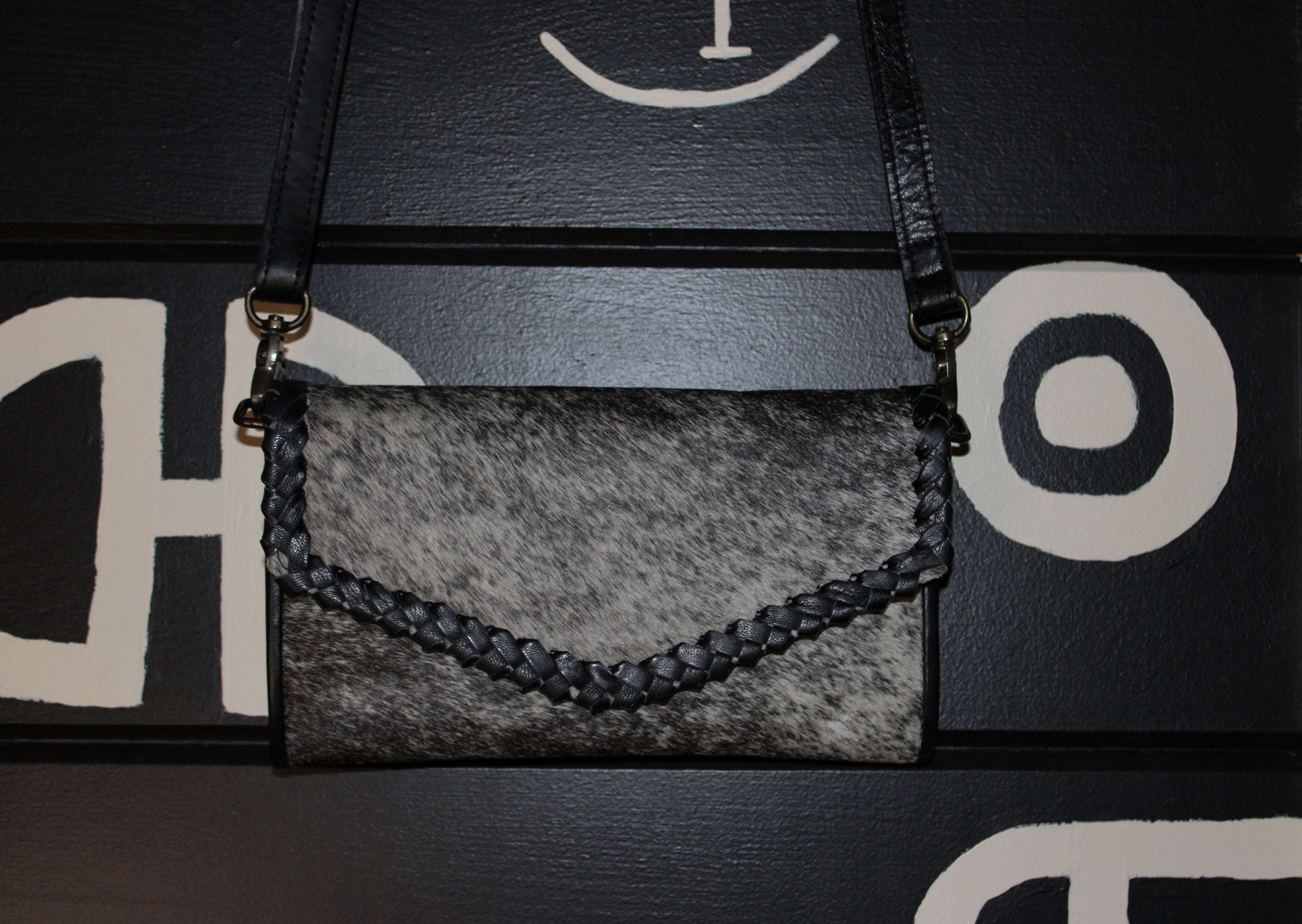 Black all hide clutch