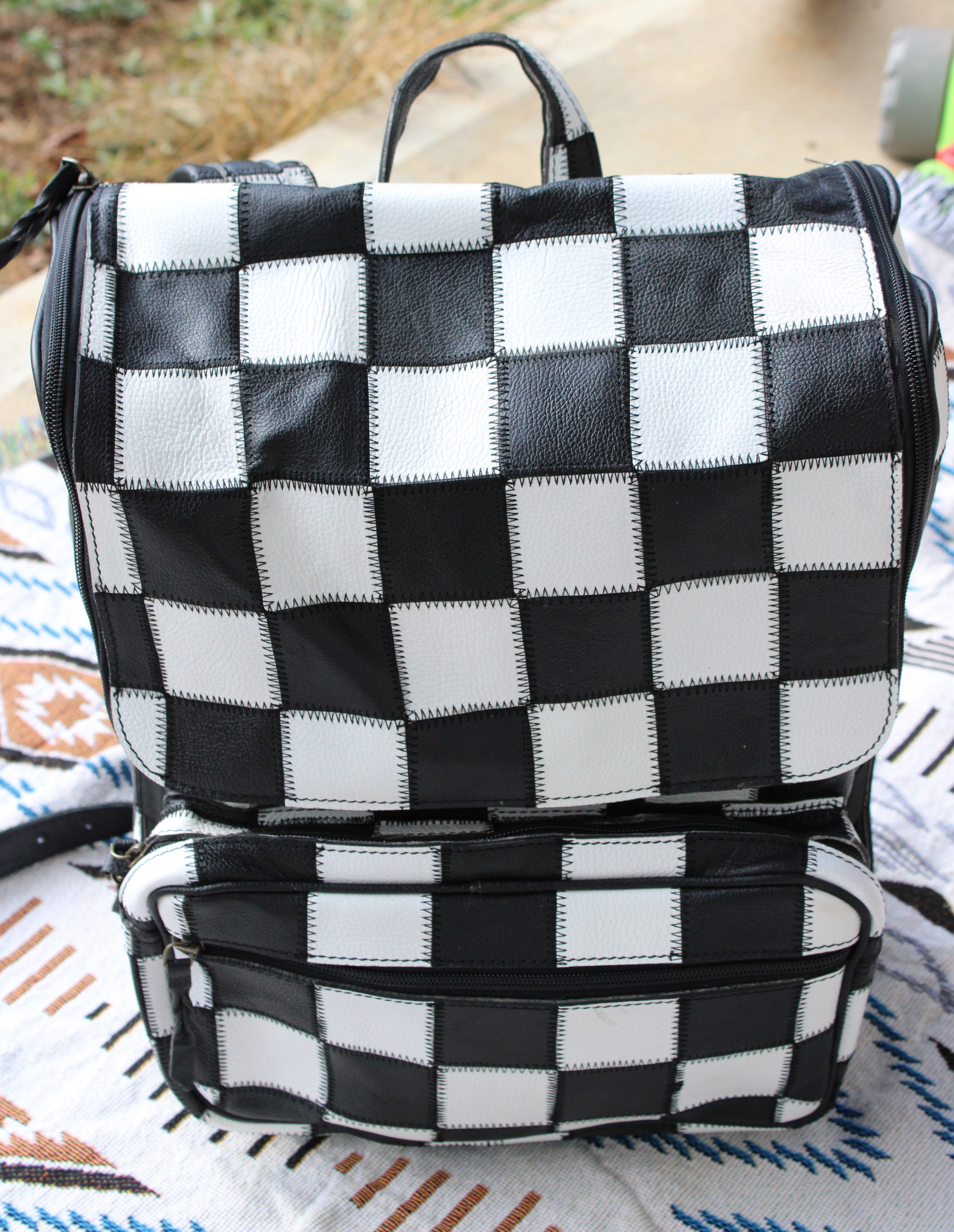 Checkered leather backpack