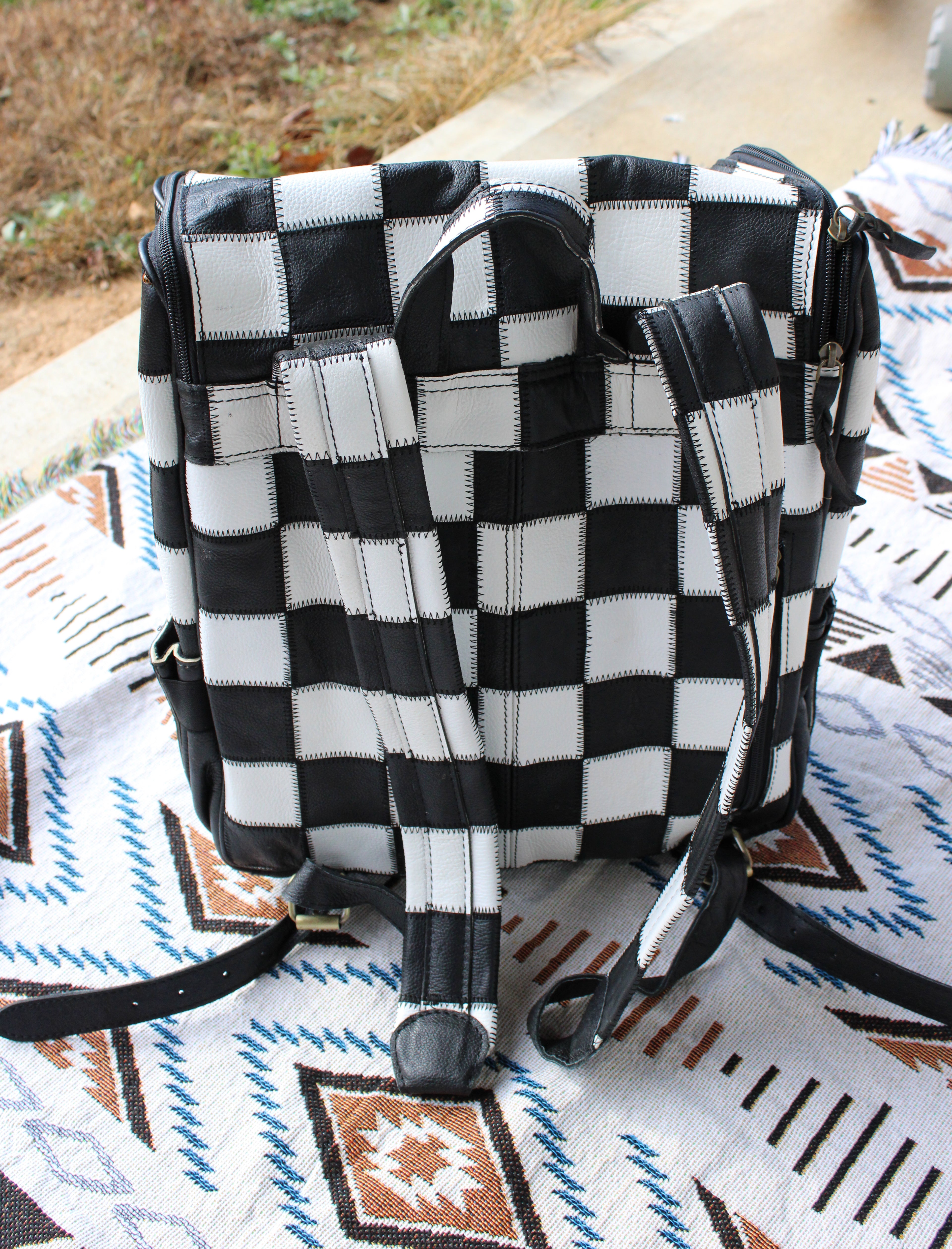 Checkered leather backpack