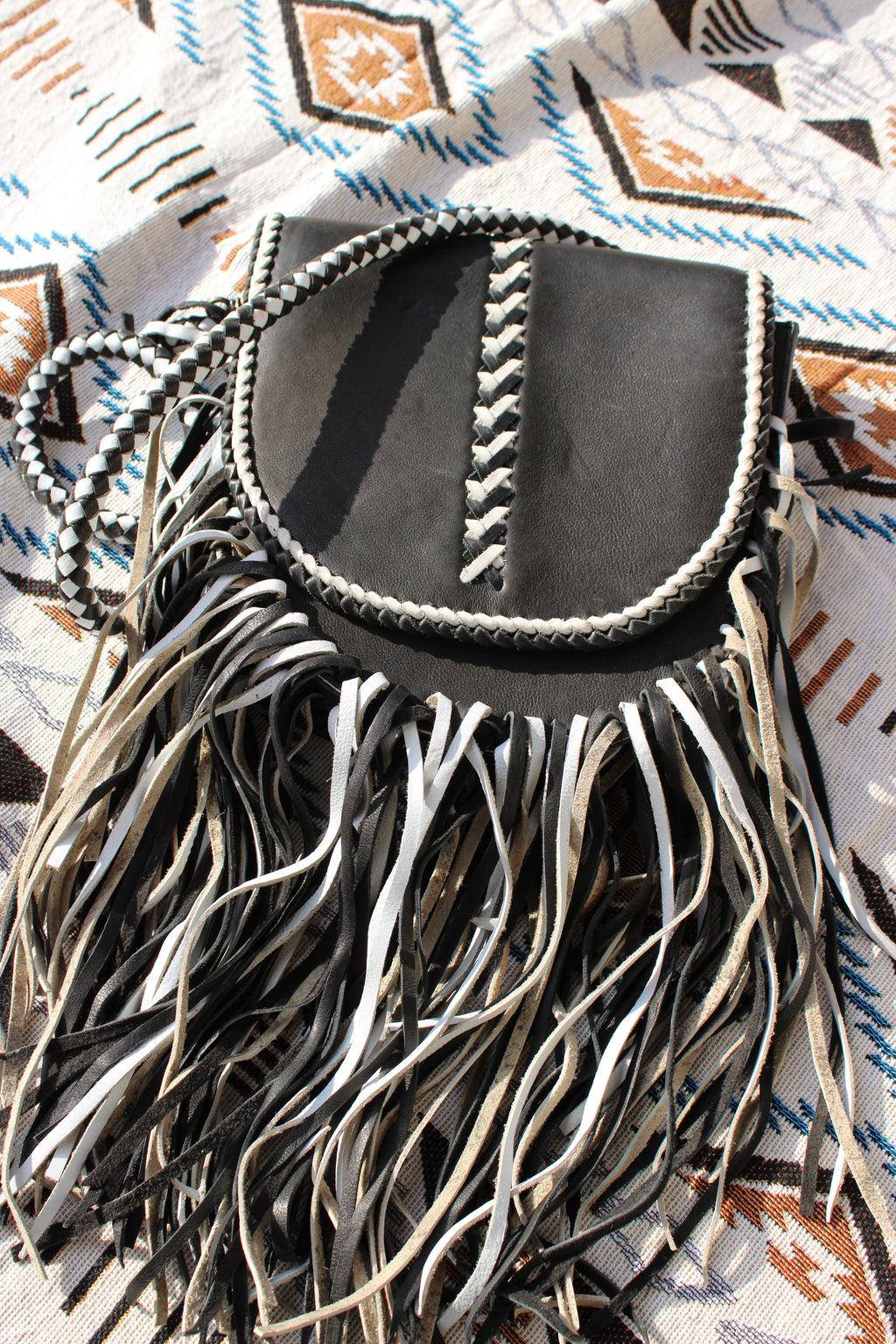 Black leather and fringe crossbody