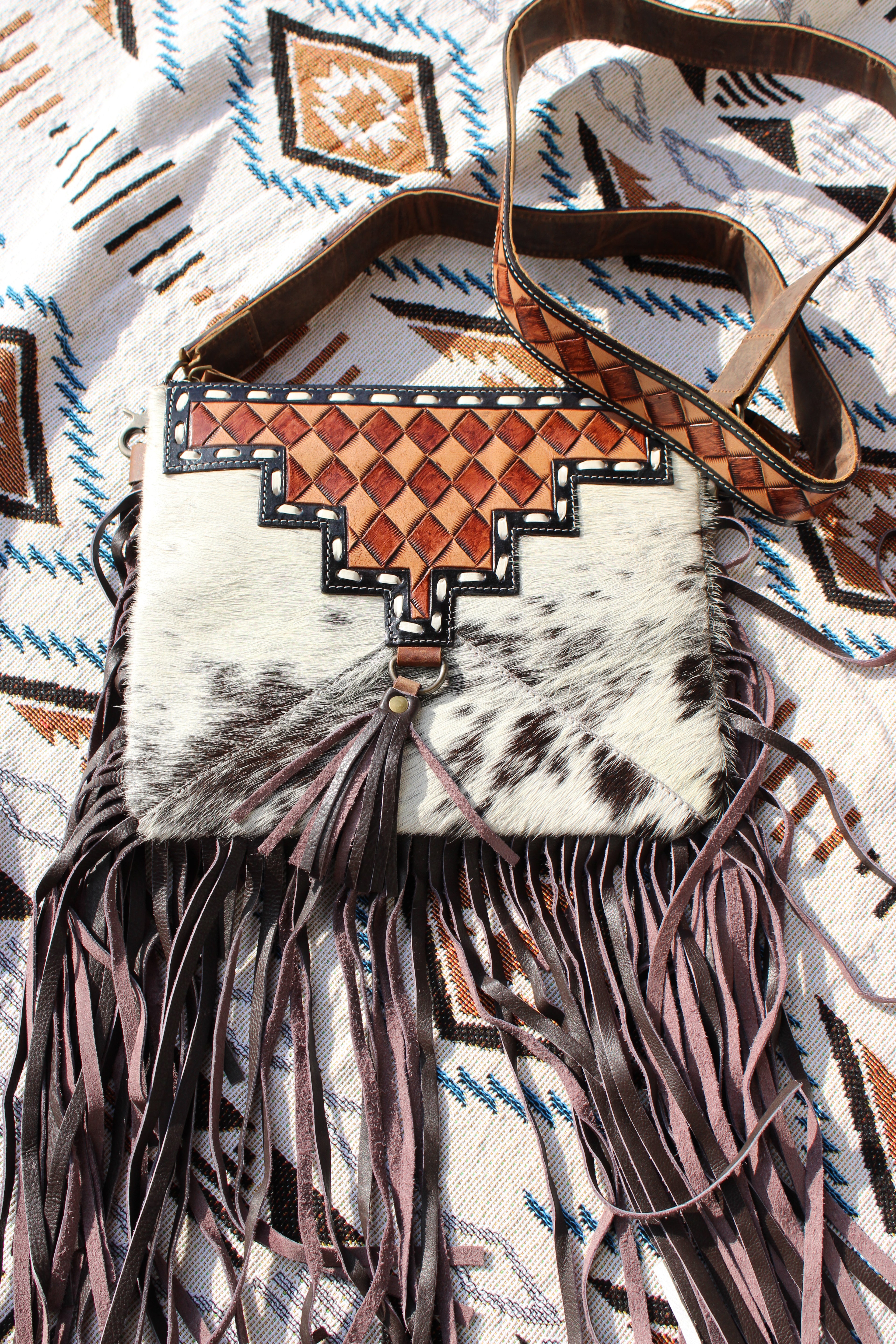 Brown checkered tooled and cowhide fringe crossbody