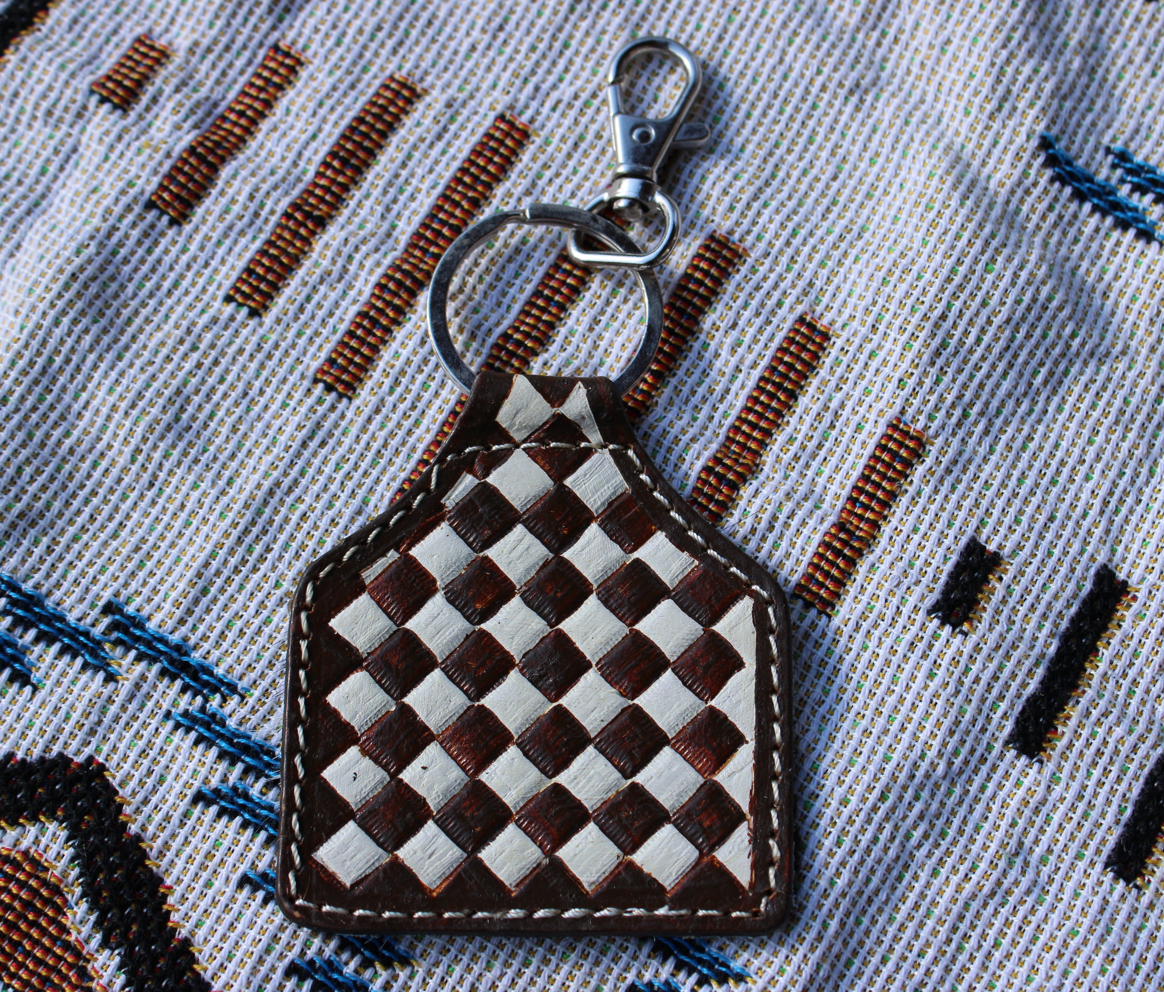Brown checkered tooled leather keychain