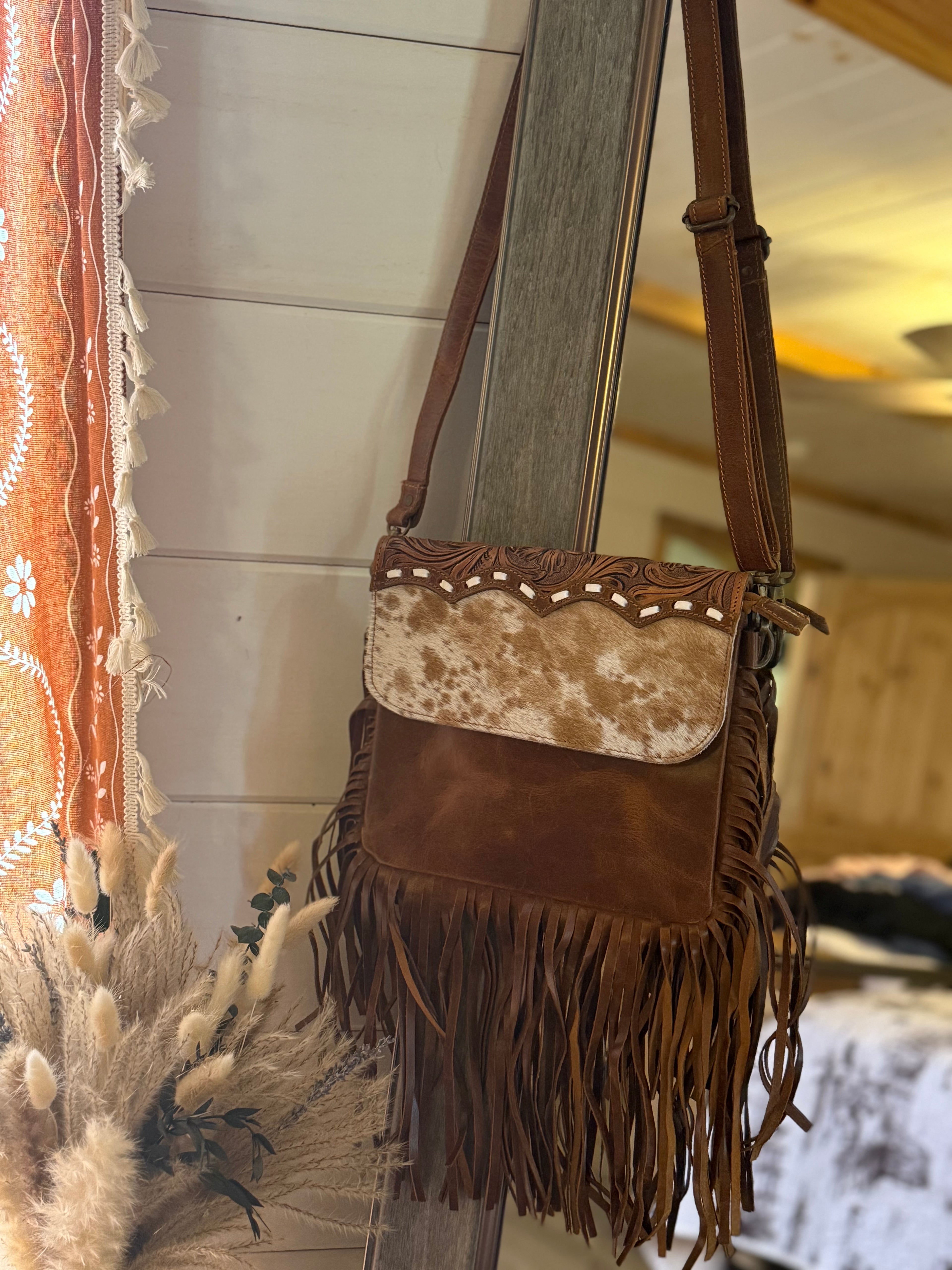 Cowhide and fringe genuine leather crossbody